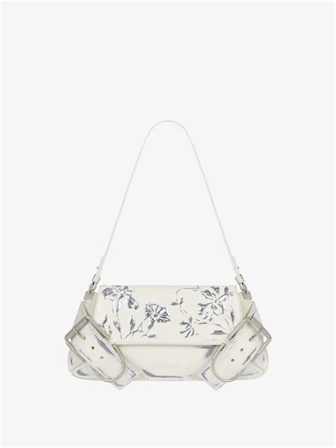 givenchy floral zip pouch|Voyou pouch in raffia with floral embroidery .